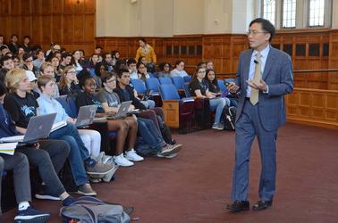 Dean Marvin Chun teaching in front of a room of students